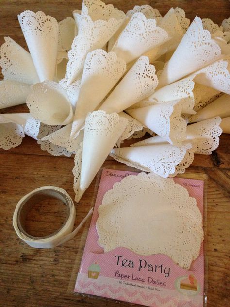 Handmade wedding confetti cones from mini round doilies and glue dots... Paper Doily Crafts Wedding, How To Make Confetti Cones, Paper Doilies Wedding, Doily Invitations Diy, Diy Confetti Cones, Wedding Confetti Cones, Paper Lace Doilies, Butterfly Wedding Theme, Mexican Bridal Showers