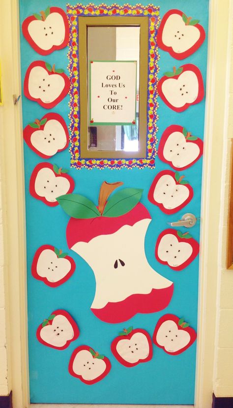 Fall Apple Door. Children made apples using construction paper and black beans… Apple Theme Classroom, Apple Bulletin Boards, Classroom Door Decorations, Preschool Door, Apple Drawing, Apple Classroom, School Door Decorations, Poster Decoration, Preschool Bulletin