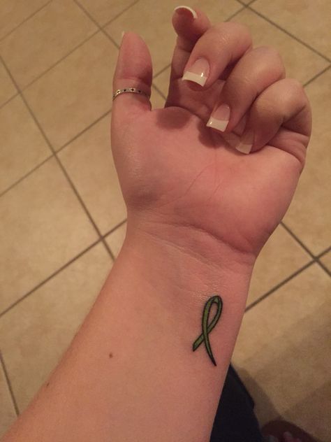 Ribbon tattoo  Muscular dystrophy  Awareness Green Ribbon Tattoo Ideas, Lymphoma Tattoo Nonhodgkins, Non Hodgkin Lymphoma Tattoo, Muscular Dystrophy Tattoo, Green Ribbon Tattoo, Tattoo Awareness, Awareness Ribbon Tattoo, Lymphoma Tattoo, Mental Health Ribbon