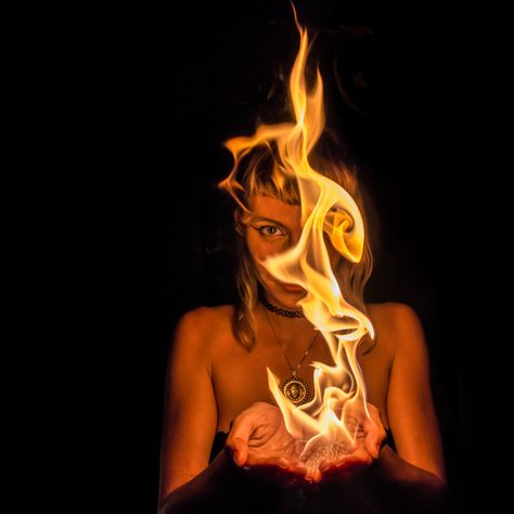 Woman Fire Photography, Woman On Fire Art, Fire Fashion Photography, Fire Photography Portrait, Holding Fire Pose, Fire Birthday Photoshoot Ideas, Fire Photography Ideas, Flames Photoshoot, Holding Fire Pose Reference