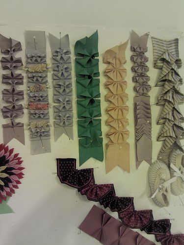 ribbon trim ideas....(love these!...all done with regular ribbons and changed into this? beautiful!)... Sulaman Pita, Smocking Patterns, Fabric Origami, Folding Origami, Textiles Techniques, Ribbon Art, 자수 디자인, Ribbon Work, Silk Ribbon Embroidery