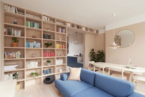 Photo 2 of 18 in A Mix of Storage Solutions Steals the Show at This Renovated London Flat - Dwell Ceiling Shelves, Modern Appartement, Tall Bookshelves, Dark Green Walls, Light Hardwood Floors, Study Nook, Study Area, London Flat, Bathroom Shelf