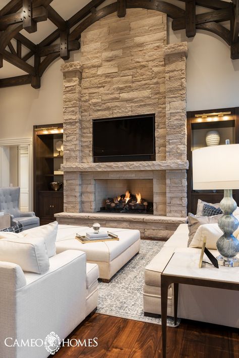 An amazing Family Room in this home built by Cameo Homes Inc. in Park City, Utah. This home was featured in the Park City Showcase of Homes. Fireplace Narrow Living Room, Amazing Fireplaces Dream Homes, Tall Living Room Fireplace, Living Room Designs With Chimney, Real Wood Fireplace Living Rooms, Brick Fireplace In Living Room, Beautiful Fireplaces Dream Homes, Grand Fireplace Ideas, Huge Stone Fireplace