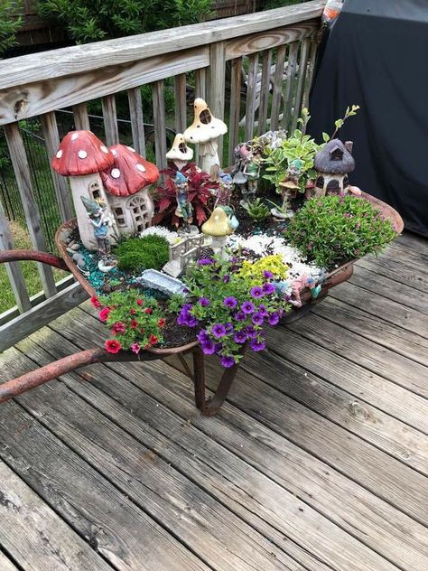 How adorable is this fairy garden in a wheelbarrow? Source: by Ann Baker 6/7/18 Fairy Garden Wheelbarrow Ideas, Wheelbarrow Fairy Garden Ideas, Wheelbarrow Fairy Garden, Wagon Fairy Garden Ideas, Diy Wheelbarrow Planter, Wheelbarrow Planter Ideas, Fairy Garden Ideas Enchanted Forest, Fairy Garden Accessories Diy, Maria Elizabeth