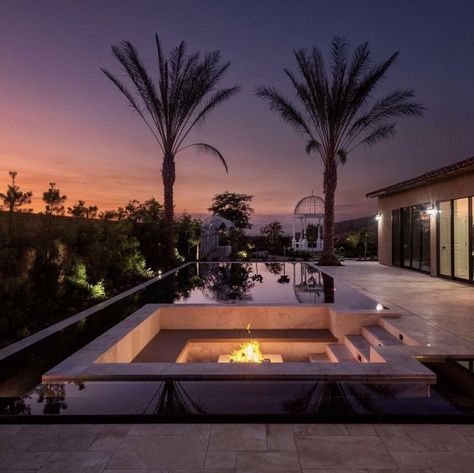 Sunset vibes. #Sunset #vibes #pool #conversationpit #exterior #minimalism #design #monochrome #masseria #lamia #lighting #puglia #lifestyle #architecture #palmtrees Conversation Pit, Minimalism Design, Sunset Vibes, Dream House Exterior, House Designs Exterior, House Inspo, Puglia, My Dream Home, Future House