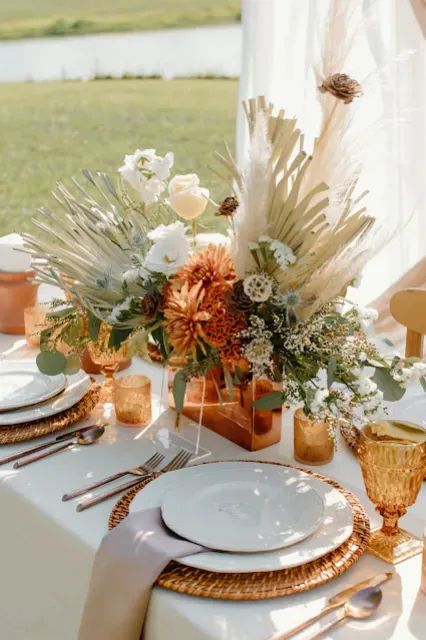 7 Ideas for a Stunning Burnt Orange Wedding Theme | City of Creative Dreams burnt orange weddings, burnt orange weddings decorations, burnt orange wedding theme, burnt orange wedding theme color combos, burnt orange wedding theme flowers, burnt orange wedding theme bridesmaid dress, burnt orange wedding theme ceremony decor, burnt orange wedding theme boho, burnt orange wedding theme rustic, burnt orange wedding theme cake Wedding Gown Alterations, Orange Wedding Themes, Deco Champetre, Burnt Orange Weddings, Summer Party Themes, West Wedding, Orange Wedding, Wedding Inspiration Fall, Event Inspiration