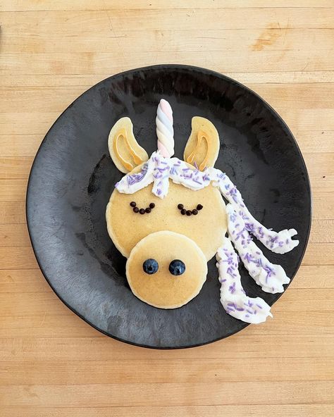 UNICORN PANCAKES 🦄🥞 . FUN FACT: I usually find inspiration for my pancakes from my kids toys and clothes... For example, this little unicorn window sticker that I am holding over my eye was the inspo for the the second unicorn 🤪AND if you look through my feed, the dinosaur pancakes were inspired by my sons dinosaur onesie 🤫 . #unicorn #unicornpancakes #pancakes #pancake #breakfast #kidfood #foodforkids #foodart #foodartblog #unicornlover Dinosaur Pancakes, Feed The Dinosaur, Unicorn Pancakes, Pancakes For Kids, Pretty Pancakes, Onesie Unicorn, Dinosaur Onesie, Easy Pancakes, Birthday Pancakes