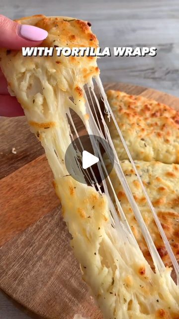 17K views · 1K likes | Food | Hacks | Recipes on Instagram: "Air fryer double layer cheesy garlic bread 😍  had to try the viral tortilla garlic bread! It’s so quick and easy to make! It’s super soft and cheesy and garlicky and it tastes amazing 🤤  Recipe: 2 medium tortillas Garlic powder/granules Mozzarella cheese Italian herbs (parsley is also fine)  Air fry for 5-6 minutes or until all the cheese has melted and the edges are golden 🤌  By: @fitwaffle  Join my Free Newsletter For More Recipes! Link In Bio😍!" Cheesy Garlic Bread In Air Fryer, Tortilla Garlic Bread, Garlic Bread Pizza, Low Carb Soup Recipes, Garlic Cheese Bread, Italian Herbs, Los Angeles Food, Usa Food, Cheesy Garlic Bread