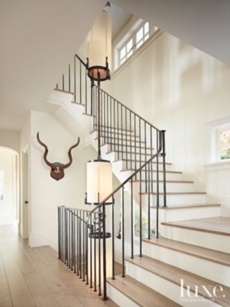 Contemporary White Stairway with Custom Light Fixture Windows Architecture, Architecture Stairs, Elegant Staircase, Metal Staircase, Foyer Staircase, Iron Stair Railing, Stair Rail, Custom Light Fixtures, Entry Stairs