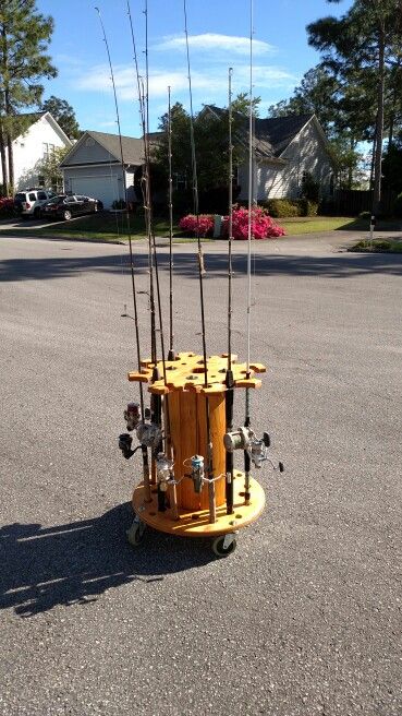 Fishing rod holder/electrical spool Electrical Spools, Wire Spool Tables, Wooden Spool Tables, Wooden Cable Spools, Wooden Spool Projects, Spool Ideas, Spool Furniture, Wire Reel, Spool Tables