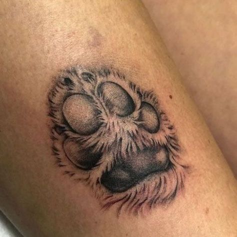 Honor the memory of your faithful companion with a beautifully crafted pet memory tattoo. #FaithfulFriend #PetBond Golden Retriever Paw Print Tattoo, Golden Retriever Paw Tattoo, Labrador Paw Tattoo, Golden Retriever Memorial Tattoo, Golden Retriever Tattoo Ideas, Dog Eyes Tattoo, Lion Paw Tattoo, Golden Retriever Tattoo Minimalist, Dog Footprint Tattoo