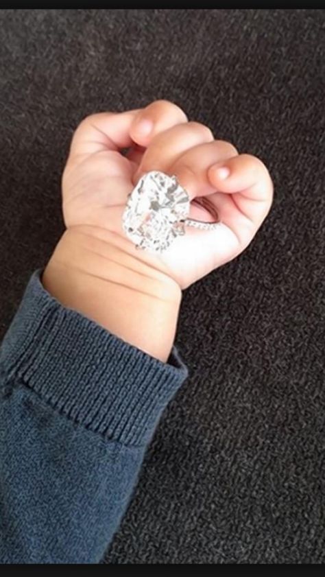 Kim Kardashian's baby" North West" wearing her engagement ring in this picture. Cute!!!!!!!!! Kim Kardashian Ring, North West Kim Kardashian, Kim Kardashian Engagement Ring, North West Baby, Huge Engagement Rings, Celebrity Rings, Big Engagement Rings, Kim And Kanye, Kim Kardashian And Kanye