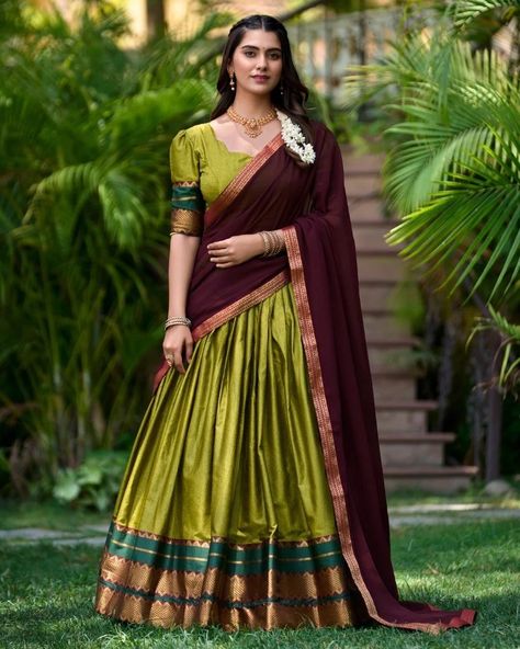 "Wrap yourself in the richness of South Indian heritage with our stunning Poly Cotton Half Saree, beautifully paired with a flowing Georgette Dupatta. A perfect blend of traditional charm and modern elegance. #weareffortlessly #SouthIndianChic #HalfSareeGoals #PolyCottonPerfection #GeorgetteDupatta #TraditionalElegance #ModernTwist #EthnicFashion #HeritageWear" Catalogue : DHRUVIKA Lehenga(Stitched) Lehenga Fabric : Poly cotton Lehenga Work : Zari Weaving Work Lehenga Waist : SUPPORTED UP ... Green Half Saree, Lehenga Stitched, Maroon Lehenga, Green Lehenga Choli, Wedding Lehenga Choli, Choli Dress, Cotton Lehenga, Half Saree Lehenga, Indian Lehenga Choli