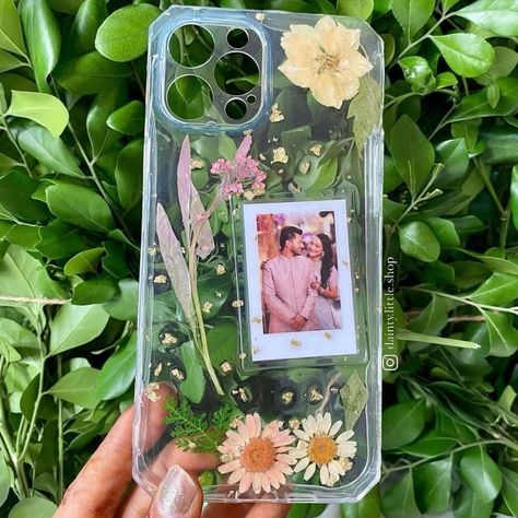 New launch: Customisable mobile covers with Photo customisation option, made with real pressed flowers. Unique way of showing love to someone you care about, gift them one now. DM to order or shop directly from our website. 🤗 #mobilecoversindia #uniquemobilecovers #photomobilecovers #customisedmobilecovers #floralmobilecover #customisedmobilecases #specialgifts #uniquegiftideas #mobilecasesindia #mobileaccessory Resin Phone Case Ideas, Diy Crafts Phone Cases, Diy Resin Phone Case, Handmade Rakhi Designs, Photo Gifts Diy, Phone Case Diy Paint, Diy Phone Case Design, Photo Phone Case, Flowers Unique