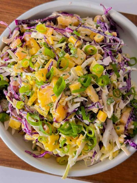 Hawaiian Coleslaw - Sweet & Savory - Foodology Geek Hawaiian Slaw Recipe, Asain Coleslaw, Hawaiian Coleslaw Recipe, Hawaiian Salads, Hawaiian Slaw, Hawaiian Coleslaw, Pineapple Coleslaw Recipe, Kalua Pulled Pork, Hawaiian Salad