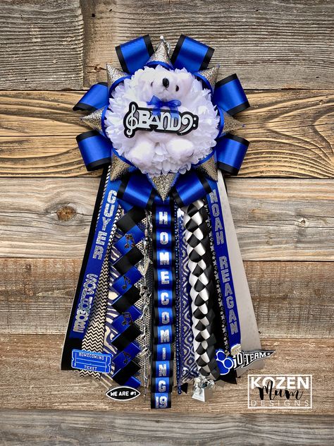 Royal blue simple single homecoming garter.  We can custom design a special homecoming mum or garter for you. Check out our Facebook page @kozenmumdesigns.     #homecominggarter #homecoming #bandgarter #bandmum #kozenmumdesigns Mums Blue And White, Simple Homecoming Mums, Football Garter, Homecoming Garter, Mini Footballs, Homecoming Mums, School Colors, Garters, Homecoming