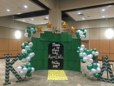 Wizard of Oz Bid Day Theme! There's no place like Kappa Delta.  Backdrop made of cardboard There’s No Place Like Homecoming Theme, No Place Like Homecoming Theme, Green Bid Day Theme, Wizard Of Oz Bid Day, Emerald City Theme, Oz Decorations, Rome Party, Ward Activities, Recruitment Graphics