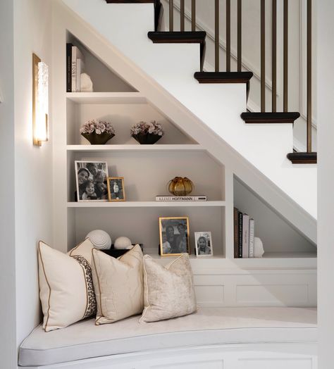 Book Storage Under Stairs, Under Stairs Reading Area, Hall Under Stairs, Under Stairs Storage Living Room, Bespoke Under Stairs Storage, Under Stairs Joinery, Under Stairs Bookshelves, Book Shelves Under Stairs, Books Under Stairs