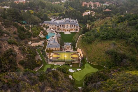 Mark Wahlberg has listed his Beverly Hills Estate. The 6-acre compound is a personal playground with a private skate park, five-hole golf course, tennis court,... Beverly Park, Paneled Library, Double Staircase, Beverly Hills Houses, Mega Mansions, Mark Wahlberg, Entrance Gates, Celebrity Houses, Skate Park