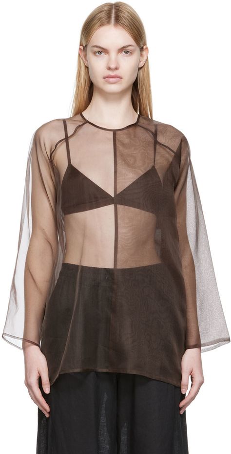 Sheer silk organza blouse. · Paneled construction · Crewneck · Single-button closure and cut-out at back Supplier color: Taupe Sheer Organza Top, Medieval Blouse, Dolman Shirt, Khaki Tops, Organza Blouse, Organza Top, Black Sheer Top, Layered Blouse, Sheer Fashion