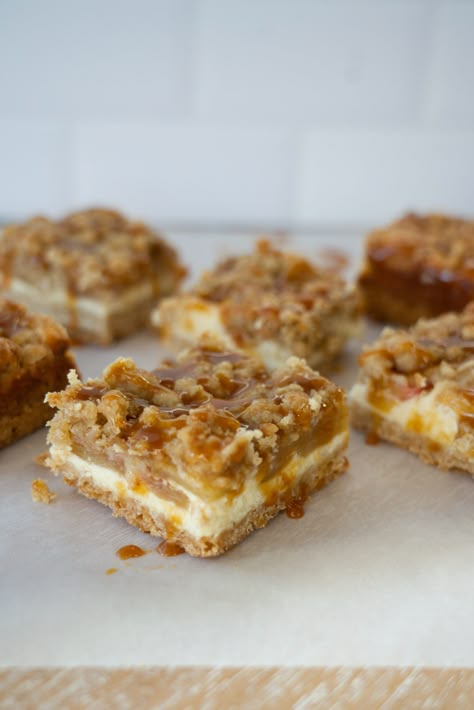 Caramel Apple Cheesecake Bars Apple Cheesecake Danish Bars 12 Tomatoes, Salted Caramel Apple Bars, Pumpkin Apple Desserts, Cheesecake Bar Recipes Easy, Call Dessert Recipes, Apple Thanksgiving Desserts, Fall Bars, Caramel Apple Crumble Bars, Carmel Apple Cheesecake Bars