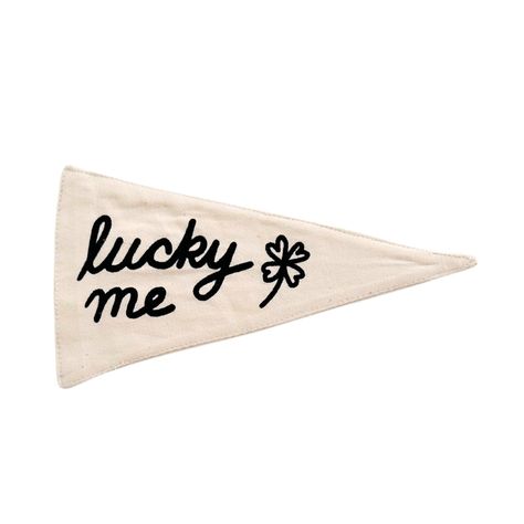 d e s c r i p t i o n "Lucky Me" Pennant Canvas Triangle Wall Flag Sewn and screen printed by hand on natural canvas by Kenyan artisans d e t a i l s + natural canvas+ 5in x 10in+ black screen print w a s h & c a r eSpot clean only. Do not put in washing machine or dryer.If your pennant is creased or wrinkled, place your pennant print side down on ironing board and iron on a low/medium heat. Do not iron on front side directly on screenprint. Do not use high heat. Do not keep iron in one place fo Diy Pennant, Nyc Rooms, Wall Decor Prints, Triangle Wall, Lucky Me, Pennant Flags, Wall Flag, Pennant Banner, Felt Pennants