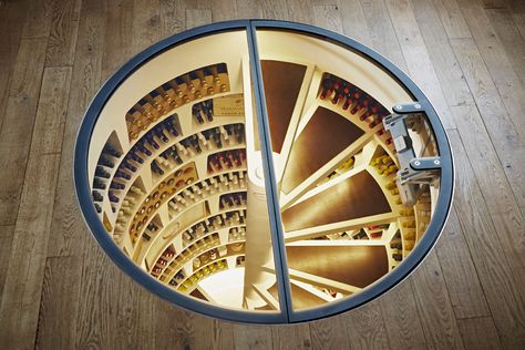 Calling all #wine lovers! Did you know that you could have a 9-foot spiral wine #cellar that stores up to 1,870 bottles in your home? If wine is one of your passions head over to azureazure.com and see what makes this wine cellar different from the rest #luxurydrinks Spiral Staircase Wine Cellar, Spiral Wine Cellar, Underground Cellar, Contemporary Wine Cellar, Wine Rooms, Home Wine Cellars, Custom Wine Cellars, Wine Cellar Design, Cellar Design