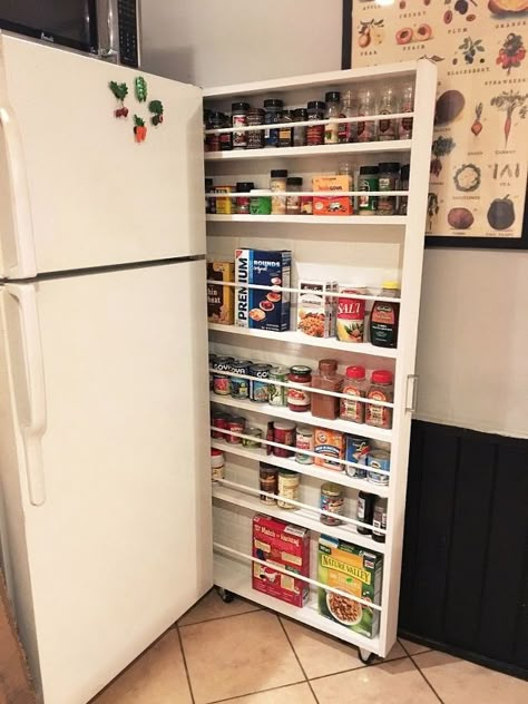 Give that space between your fridge and the wall a whole new purpose with this great storage cabinet hack. DIY hidden storage for your canned food! If you're short on space, it pulls out for easy access to whatever you need to store. diy | woodworking | storage cabinet | storage ideas, urban living, woodworking projects, Pulls out for easy access to canned goods etc Pantry Can Organization, Cabinet Hack, Organiser Cucina, Food Storage Cabinet, Diy Hidden Storage, Canned Food Storage, Pantry Wall, Faux Brick Walls, Kitchen Diy Makeover