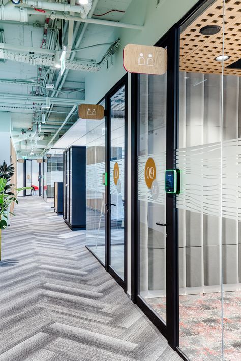 Kinsey notes: I like the use of the attached wooden slats, but for us I'd use it to list the conference room name. Meeting Room Signage Design, Office Room Signage, Room Signage Design, Meeting Room Sign, Meeting Room Signage, Office Signage Design, Glass Graphics, Room Signage, Door Signage