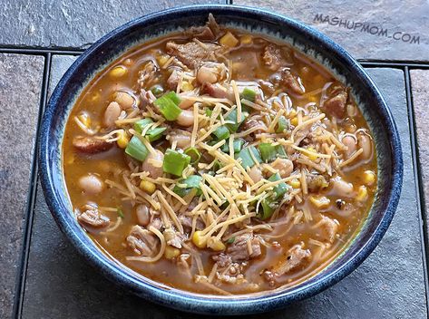 bowl of leftover pulled pork chili topped with cheese and green onions Pulled Pork Chili Recipe, Pork Chili Recipe, Pulled Pork Chili, Pulled Pork Leftover Recipes, Chili Slow Cooker, Leftover Pulled Pork, Pork Chili, Aldi Meal Plan, Chili Toppings