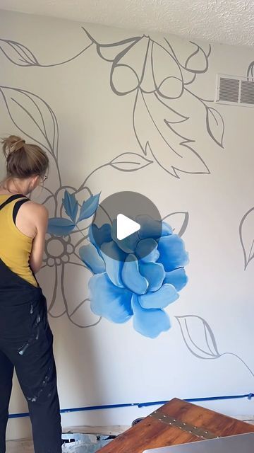 Megan Jefferson Art on Instagram: "I loved painting these layers of flowers! This bedroom is so dreamy!  #painting #mural #bedroomdesign #paintedflowers #paintedwall #interiors #paintedwalls #paintedwallpaper #blue #flowers" Large Painted Flowers On Wall, Floral Wall Painting Ideas Hand, Acrylic Paint On Walls Bedroom, Easy Wall Murals Painted Diy Art Ideas, Flower Wall Murals Painted Diy, Hand Painted Flowers On Wall, Floral Wall Mural Painting, Painted Murals On Walls, Kitchen Mural Ideas