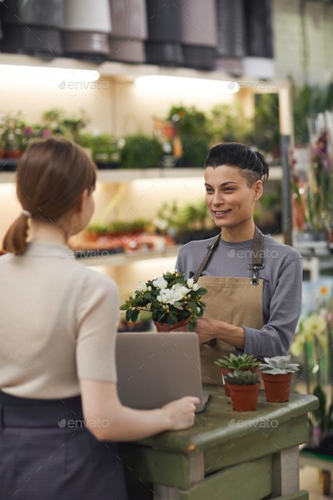 Smiling Saleswoman in Flower Shop by seventyfourimages. Waist up portrait of modern young woman selling flowers to customer in flower shop and smiling cheerfully #AD #Waist, #seventyfourimages, #modern, #portrait Flower Seller Photography, Flower Seller Painting, Florist Shop Drawing, Florist Shop Illustration, Waist Up Portrait, Selling Flowers, Flower Market Tokyo Print, Modern Portrait, Young Woman