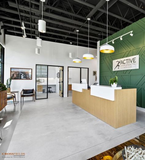 Calm Clinic Design, Sports Chiropractic Office, Body Shop Office Ideas, Chiropractic Office Waiting Room, Boutique Medical Office, Chiro Office Design, Modern Physiotherapy Clinic, Chiropractic Reception Area, Physician Office Design