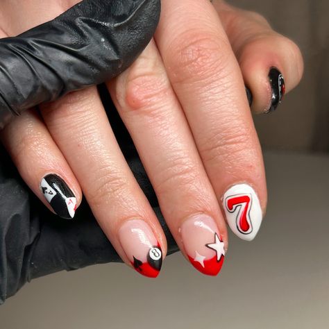 These baddies are headed to the nfr  rodeo nails las vegas nail inspo travel nails rodeo nail art 7 cherries billiard ball 8 ball nails stars spades hearts cloves clubs ace of spades ace of hearts ace of clubs ace of cloves dice gambling aesthetic nails art black white and red nail inspo hand painted nail art almond nails sharp almond nails pointy almond shape black white french tips cute nail art inspo fun nail designs luminary Billiard Nail Design, Almond Nails Pointy, Nails Sharp Almond, 8 Ball Nail Art, Gambling Nails, Sharp Almond Nails, Nails Las Vegas, Nail Art Almond Nails, Pointy Almond