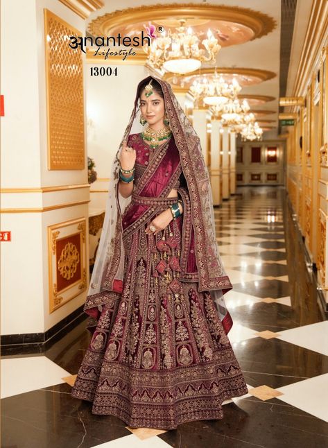 The Wedding Wear Bridal Lycra Velvet Lehenga Cholis are the perfect choice for brides who want a stunning, luxurious look on their special day. With beautiful embellishments and a comfortable fit, you’ll feel like the queen of your day. So, don’t wait! Shop Online today and make your wedding day dreams come true! 👑💖

Price: Rs. 19,175 + Shipping Extra Velvet Lehenga Designs, Maroon Lehenga, Velvet Suit Design, Velvet Lehenga, Frock Style, Bollywood Dress, Purple Saree, Orange Saree, Lehenga Blouse