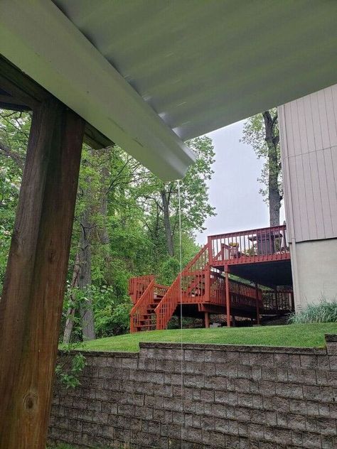 Our deck was in good shape structurally but was not aesthetically pleasing. You may remember from my earlier blog post that I painted the deck above with solid stain. Converting the space underneath was the next project. We had pavers there but the ceiling/joists from the bottom of the deck looked weathered and ugly, plus water would get through during rain. This is the before. Additionally we built the railing but that was a past project that I didn't document. Before that there was… Underneath Patio Roof Ideas, Under Deck Roofing Ceilings, Diy Under Deck Ceiling, Finish Under Deck, Waterproofing Under Deck, How To Waterproof Under Deck, How To Make Under Deck Waterproof, Under Deck Roofing, Under Deck Ceiling