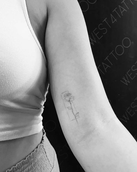 Single needle rose tattoo on the left inner arm. Tattoo Inside Arm Above Elbow, Rose Single Needle Tattoo, Small Tattoos On Arms For Women, Rose Tattoo On Upper Arm, Lower Elbow Tattoo Women, Rose Inner Bicep Tattoo, Dainty Inner Arm Tattoo, Inside Of Upper Arm Tattoo Women, Rose Tattoo Inside Arm