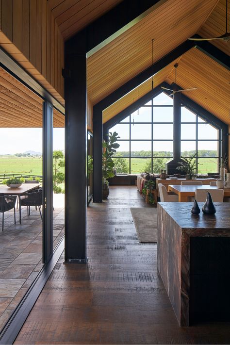 Barndominium Lots Of Windows, Modern Cathedral Ceiling, Lowered Living Room, Barn House Architecture, Raked Ceiling Living Room, Modern Barn House Interior, Modern Vaulted Ceiling, Modern Barn Interior, Steel Frame Building