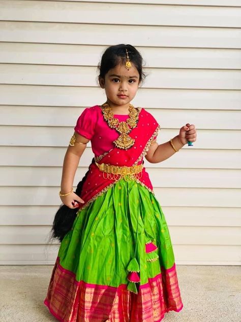 Cute little girl green and pink combination pattu lehenga Baby Girl Langa Blouse Designs, Lehenga For Baby Girl, Kids Lehenga Blouse Designs, Baby Girl Pattu Langa Designs, Kids Pattu Langa Designs, Pattu Langa For Kids, Pattu Lehenga For Kids, Green And Pink Combination, Langa Blouse For Kids