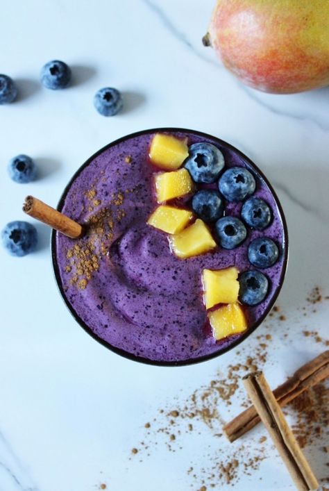 Blueberry Mango Smoothie Bowl Blueberry Mango Smoothie, Blueberry Mango, Mango Smoothie Bowl, Healthy Blueberry, Smoothie Bowl Recipe, Mango Smoothie, Banana Blueberry, Frozen Blueberries, Quick Healthy