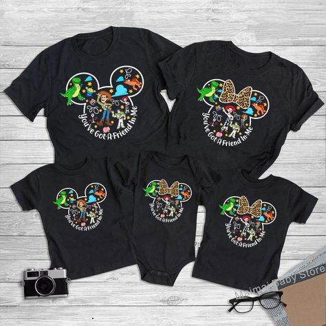 Make your Disneyland 2024 trip a real blast with these new Toy Story matching Disney family shirts! Featuring everyone's favorite characters - Woody, Buzz, Mickey & Minnie - these comfy tees are bursting with fun and "You've Got a Friend In Me" vibes. Perfect for adults, kids, and the whole crew! Free Shipping! Hashtags:  #disneyfamily #di#disneyvacation #matchingfamilyshirts #toystory #toystory4 #buzzlightyear #woody #mickeymouse #minniemouse #disneyfun #disneystyle #familyshirts #freeshipping Disney World Shirt Ideas, Family Vacation Outfits, Toy Story Shirts, Disneyland 2024, Family Disney Shirts Matching, Family Matching Shirts, Toy Story Shirt, Disney Family, Shirts Funny