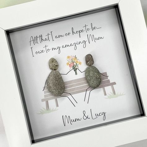 Our personalised Mothers Day 'Bench' pebble picture makes the perfect gift for your mum this Mothers Day, Birthday or Christmas. Personalise with your own names under the bench where you and your mum are sat holding a beautiful bunch of flowers. 'All that I am or hope to be...I owe to my amazing mum'. Features: Acrylic Frame - Perfect blend of lightness and durability Glass Aperture Front - Provides a premium finish with a pristine shine Folding Strut on Reverse - Angled to allow landscape or po My Best Friend's Birthday, Acrylic Frame, Pebble Pictures, Mum Birthday Gift, Garden Artwork, Collage Art Mixed Media, Mum Birthday, Mother Birthday Gifts, Acrylic Frames