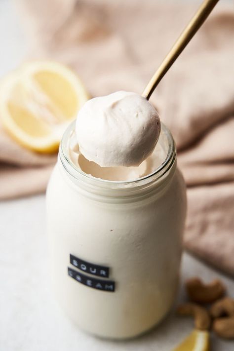 This dairy-free sour cream recipe is a thick, rich, and tangy replacement for regular sour cream. Whether you're plant-based or just want to cut down on milk products, enjoy this condiment with burritos, tacos, chilis, soups, and more! Made from a base of cashews, it is made tangy from lemon juice or apple cider vinegar. Try this easy recipe to serve with dinner tonight! #dairyfreesourcream #vegansourcream #cashewcream Dairy Free Sour Cream, Vegan Fish And Chips, Vegan Heavy Cream, Sour Cream Recipe, Vegan Condensed Milk, Vegan Breakfast Casserole, Sour Cream Substitute, Df Recipes, Zesty Salad