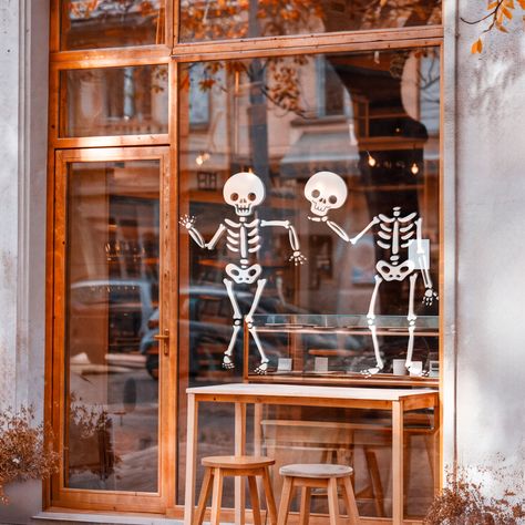 Get in the spooky spirit with our skeleton retail vinyl's who are sure to delight passers by. Ideal for adding a spooky design to your shop windows. These Halloween retail graphics are an easy way to create an instant impact with your visual merchandising. They're easy to apply and remove, just follow the simple instructions included with your purchase. Precision cut to ensure a sharp image and made from high quality vinyl. Each wall sticker is made in the Nutmeg Studio based in Buckinghamshire September Window Display, Halloween Storefront Window Display, Storefront Halloween Display, Halloween Window Display Home, Halloween Shop Window, Halloween Business Window Display, Halloween Displays Retail, Halloween Shop Window Display, Halloween Window Display Paint