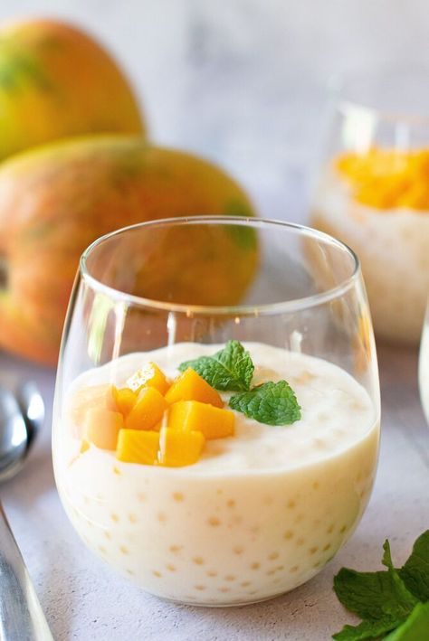 This is a tropical twist on a classic tapioca recipe. Pairs perfectly with fresh mango for a Thai-themed dessert. But honestly, you can’t go wrong using any fresh fruit; strawberries, raspberries, blackberries, peaches…The sky is the limit! Tapioca is a classic dessert. You can find my recipe for classic tapioca here. But there are so many other variations as well. I have had sweet potato tapioca, honeydew tapioca and pumpkin tapioca. I have some variations of my own swirling around… Tapioca Recipe, Coconut Tapioca Pudding, Tapioca Dessert, Coconut Tapioca, Tapioca Recipes, Asian Dessert, Tapioca Pudding, Tapioca Pearls, Mango Puree