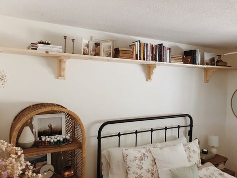 Long Bookshelf Above Bed, Long Bedroom Shelf, Bedroom With Shelf Above Bed, Long Shelf Above Bed, Bookshelf Above Bed, Shelf Above Window, Bedroom Shelf Decor, Real Bedroom, Shelf Above Bed