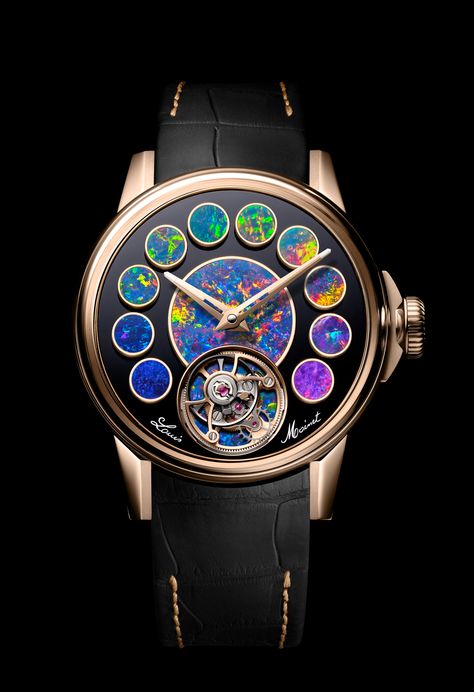 The Louis Moinet Geopolis Opal comes on the back of last year’s Cosmpolis model, an exceptional watch with a dial incorporating 12 meteorites, the ‘most meteorite inserts in a watch’. On this occasion, the Geopolis Opal swaps said meteorites for the eponymous rainbow-evincing stones. Mark McArthur-Christie provides an insight into the making of this watch, a product of love not ego. #louismoinet #saintblaise#flyingtourbillon #jeanmarieschaller Saint Blaise, Laurent Ferrier, Louis Moinet, Book Jewelry, Watch Review, Expensive Watches, Rainbow Colours, Light Of The World, Watches Unique