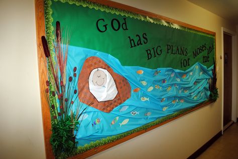 Baby Moses bulletin board with fish that the children decorated. Moses And Red Sea, Infant Bulletin Board, Sea Bulletin Board, Bible Bulletin Boards, Class Bulletin Boards, Sunday School Classroom, Preschool Bulletin, Church Bulletin Boards, Baby Moses