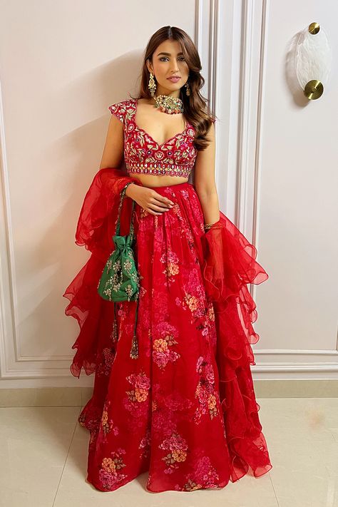 FIERY RED FLORAL PRINTED LEHENGA SET AND AN EMBROIDERED BLOUSE PAIRED WITH A MATCHING RUFFLED DUPATTA AND MIRROR WORK DETAILS. - Seasons India Ruffle Dupatta Lehenga, Lehenga With Ruffle Dupatta, Ruffle Lehenga, Ruffle Dupatta, Printed Lehenga, Kids Blouse, Unstitched Suits, Indian Attire, Fiery Red