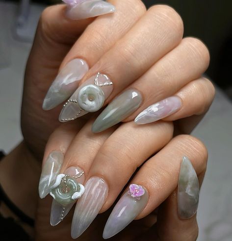 💜 Orchid Garden 🤍 Medium Stiletto Gel-X with foreign removal and complimentary hand massage for a 2.5hr session ♡ Client’s inspo request was for a muted jade theme with the addition of my orchids ☺️🌸 February spots available, please DM to book ✨ #nailinspo #naildesign #3dnailart #jadenails #snakenails #orchidnails #vancouvernails #3dnails #gelxinspo #gelxnails #trendynails #nails2inspire #pinterestnails #stilettonails Orchid Nails, Medium Stiletto, Jade Nails, 2024 Nails, Orchid Garden, Fantasy Nails, Orchids Garden, Hand Massage, 3d Nail Art